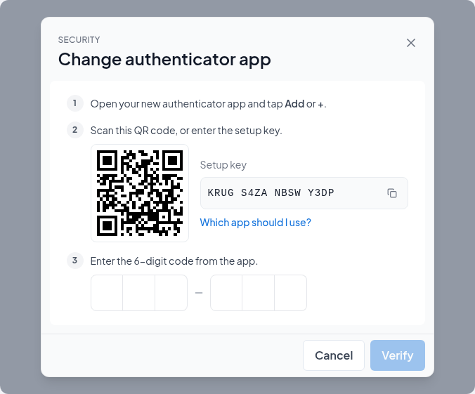 The Change authenticator app dialog with a new QR code and setup key